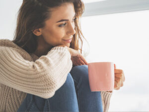 Aleris Fertility Woman Smiling Drinking Coffee 1024x768