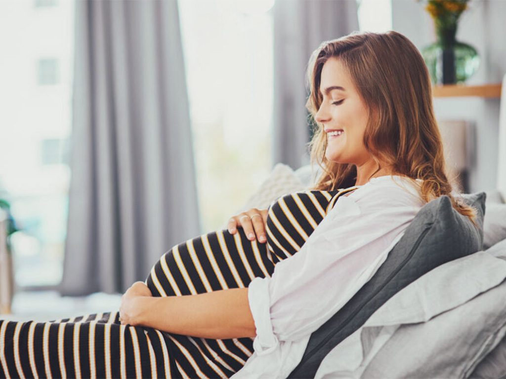 Aleris Fertility Woman Pregnant Happy